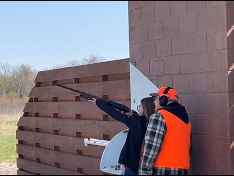 Megan Wiltshire shooting shotgun